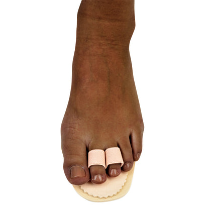 A foot wearing a Silipos Toe Splint, with beige fabric bands around two toes on a cushioned pad.