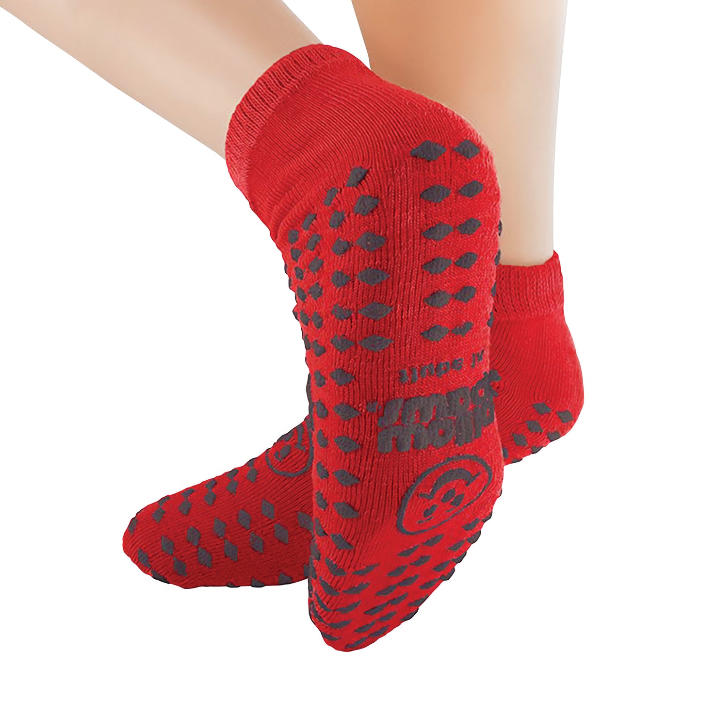 Close-up of red Pillow Paws Double Print Risk-Alert Socks featuring gray non-slip grips and lettering on the soles.