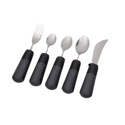 Five Good Grips Standard Utensils with large black rubber handles: a fork, two spoons, and two serrated knives.