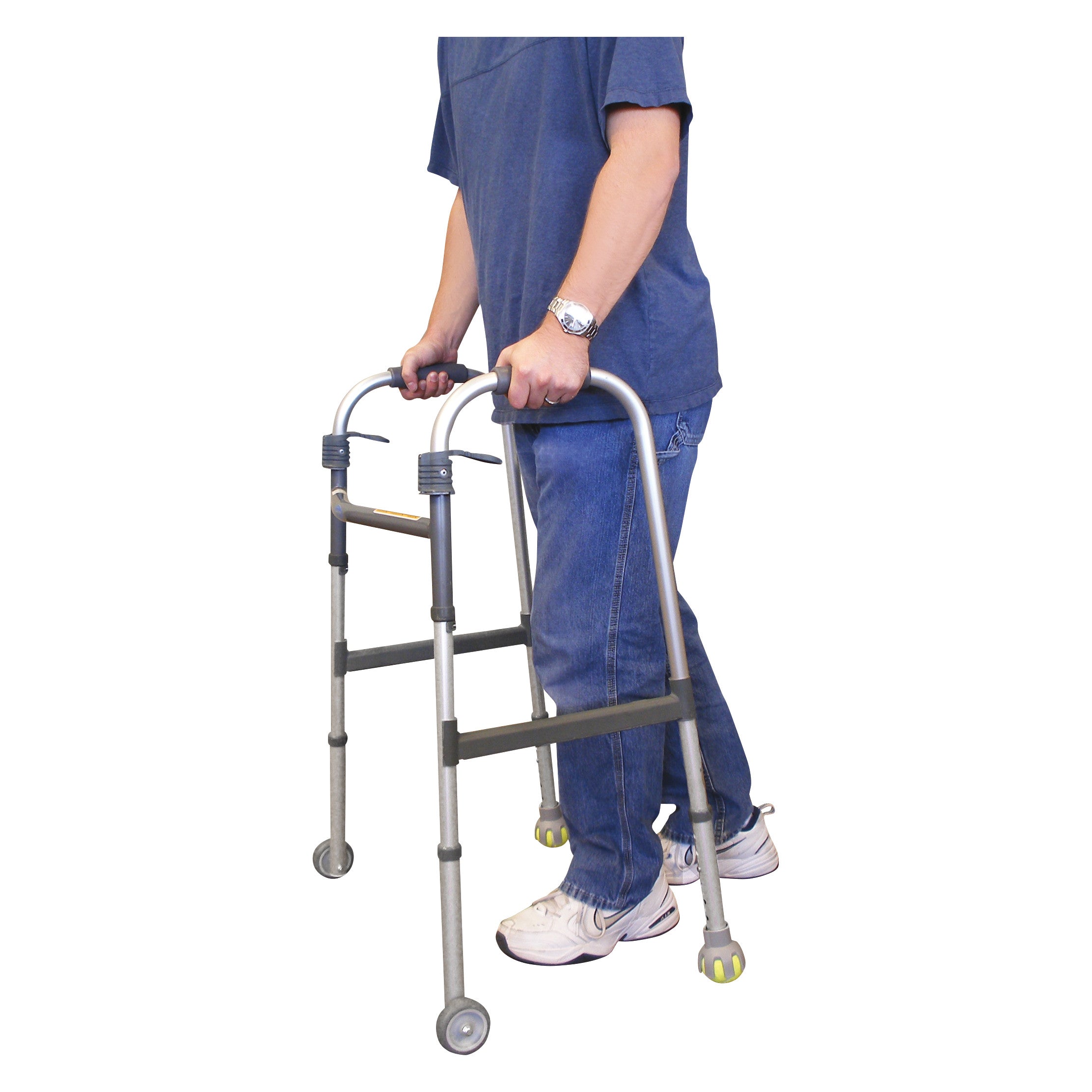 A person uses the Therafin Walker Tennis Ball Glide, a metal walker with tennis ball feet and hand grips, wearing casual attire.