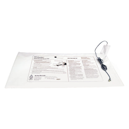 Sensatec Fall Management Bed Sensor Pad lies flat, featuring instructions and a connected cable at one end.
