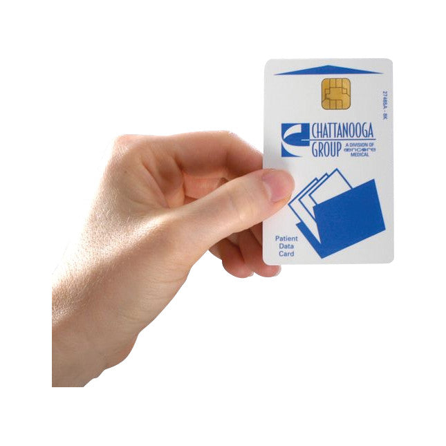 A person's hand holds a "Data Card for Chattanooga Intelect Legend XT Electrotherapy System" featuring a chip and blue logo.