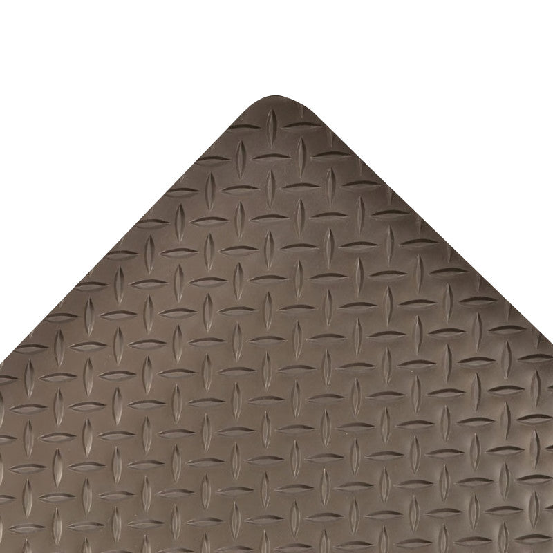 Close-up of the Saddle Trax Anti-Fatigue Mat showing its diamond-patterned surface and rounded corner, in a brown color.