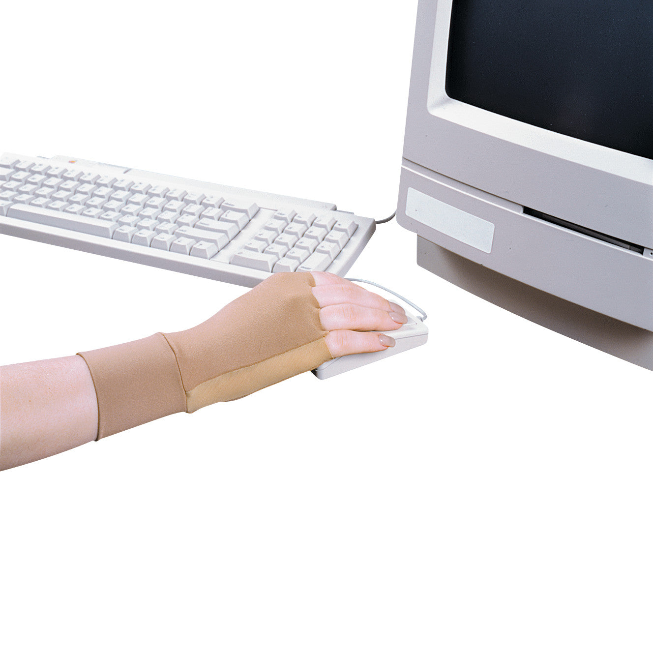 A hand wearing Thera-Gloves uses a computer mouse. A keyboard and a monitor are visible in the background.