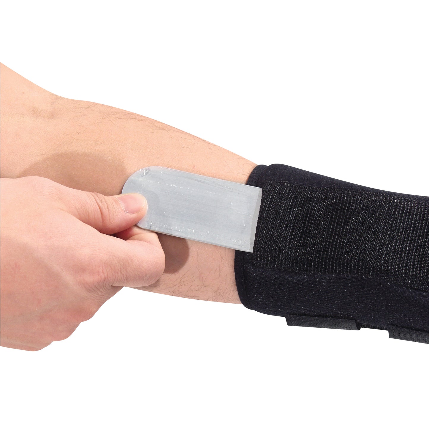 A person adjusts the AliMed FREEDOM Comfort Wrist Support with a metal insert on their arm, showcasing its fit and support.