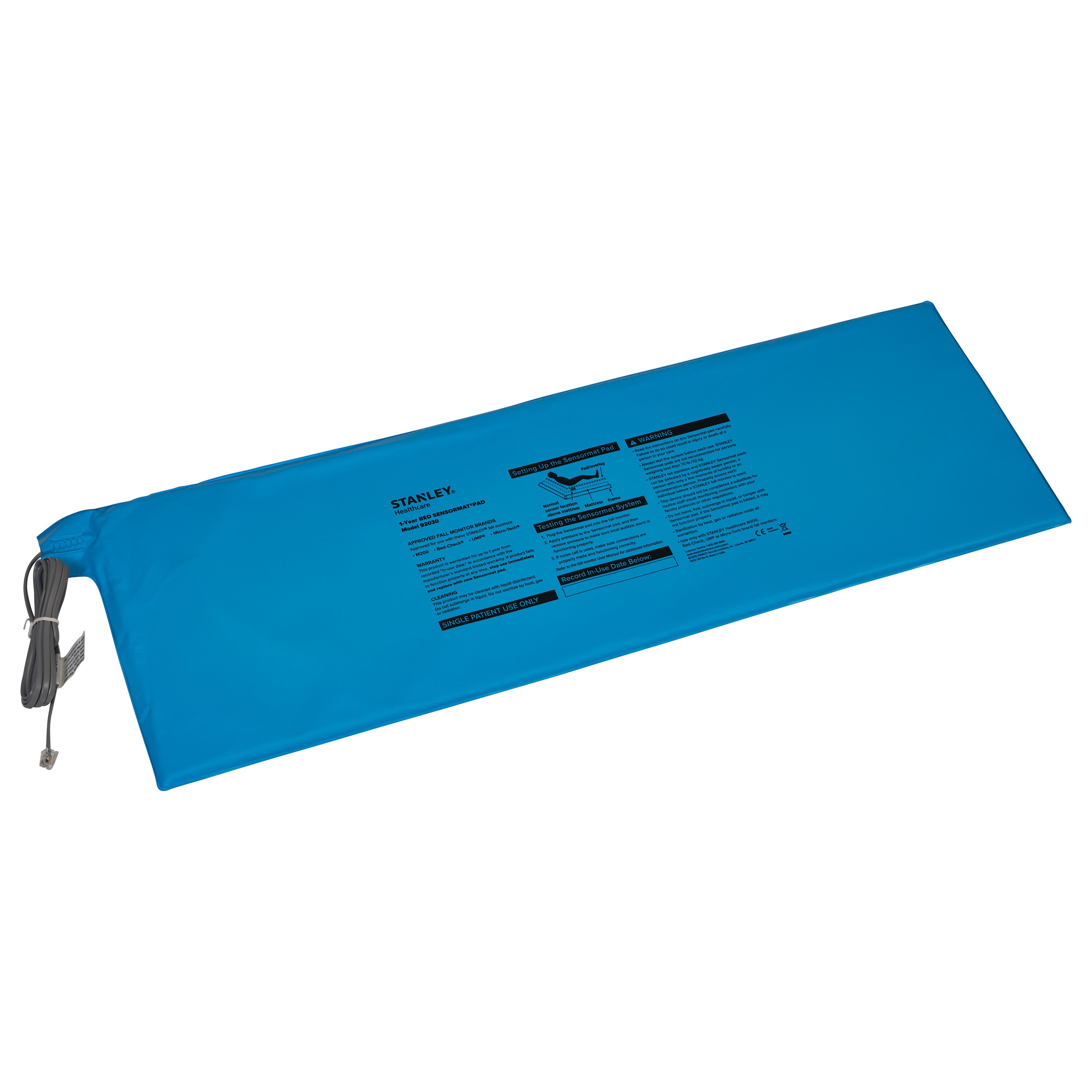 A blue UMP Bed Sensor Pad with printed instructions, featuring a cord attached at one end.