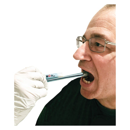 A person using the TheraSIP ThermalSTIM PLUS, with a gloved hand holding it to their open mouth for oral therapy.