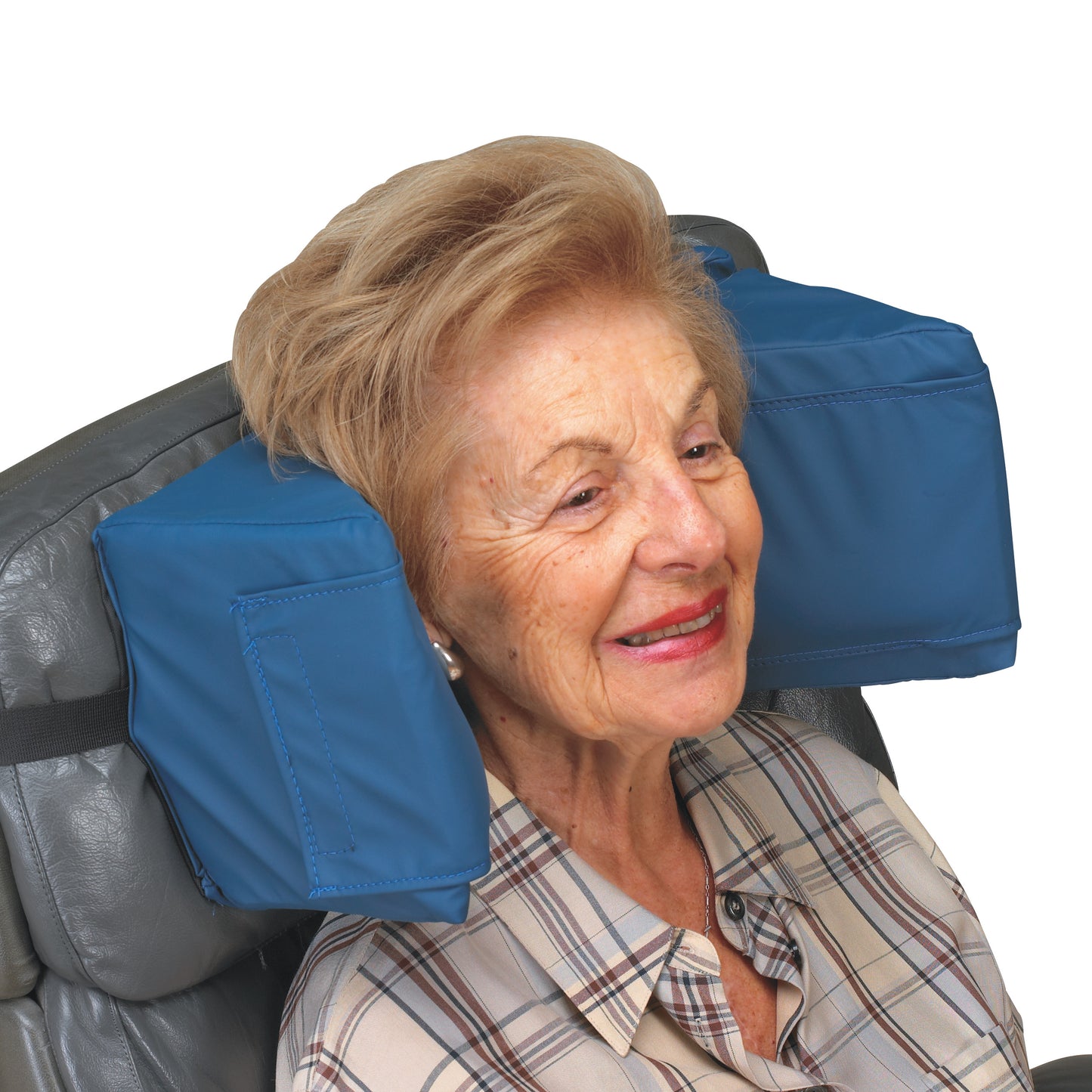 An older woman using the SkiL-Care Adjustable Gel Headrest. It's blue and attached to a gray chair, providing head support.