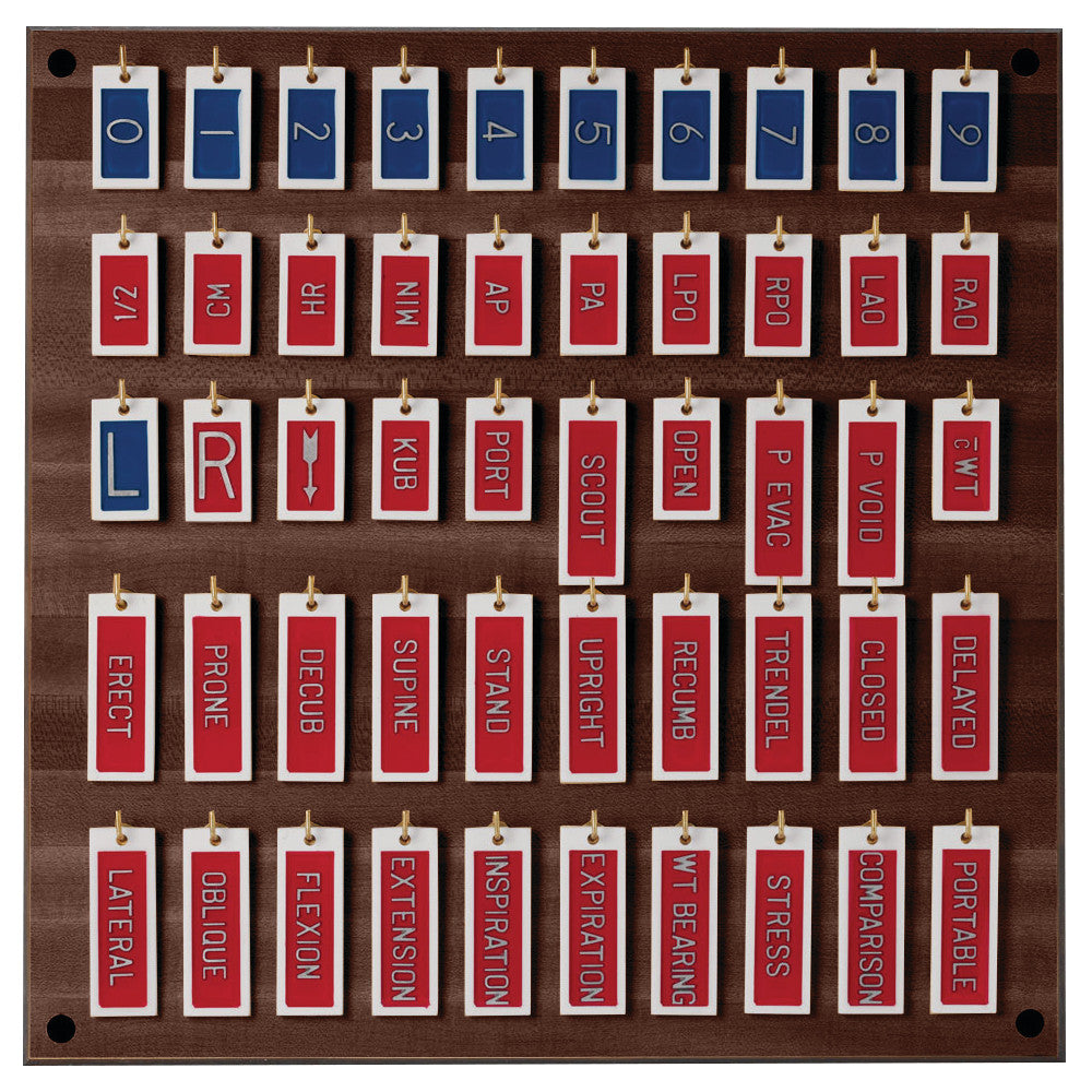 General X-Ray Marker Set on a wooden board, featuring rows of blue and red labeled markers with various medical terms and numbers.
