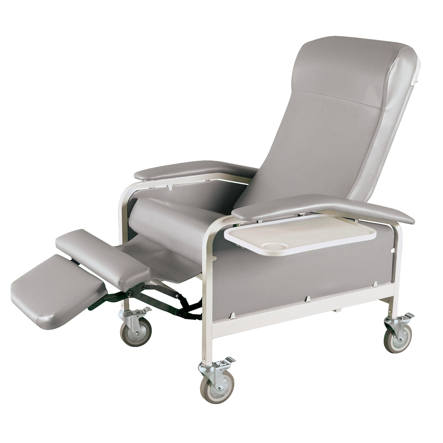 A Winco Drop Arm Care Cliner with gray upholstery, adjustable footrest, and swivel casters. It has a tray attached to the side.
