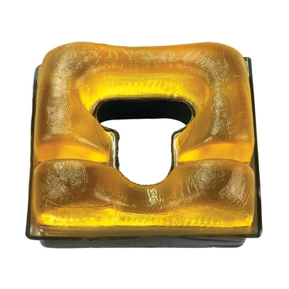 AliMed AliGel Prone Head Pad in a golden-brown color with a central opening, designed for head support in a prone position.