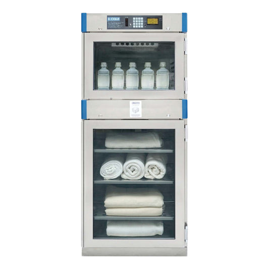 Blickman 3-Shelf Digital Warming Cabinet with display. It holds bottles on the top shelf and rolled towels on the lower shelves.