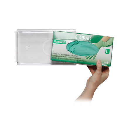A hand holds a box of Curad Aloetouch latex gloves near an AliMed Clear PETG Glove Dispenser.