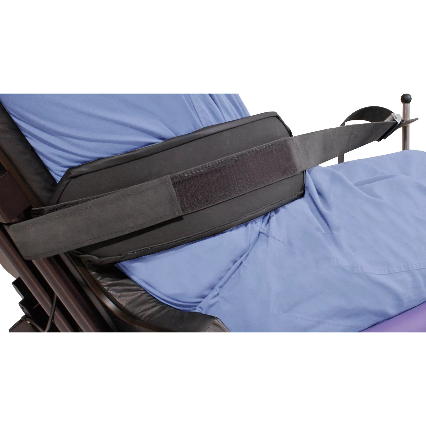 A person sits on a chair wearing a Counter Traction Strap for Allen Manual Lift Beach Chair, designed for stability and support.