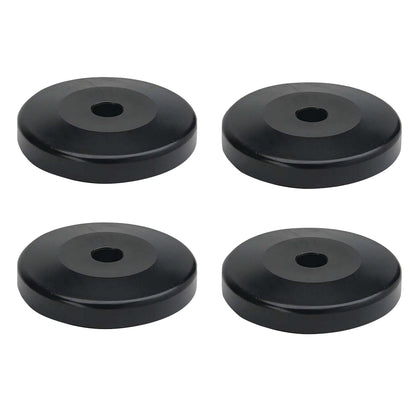 A set of four black, round plastic donut bumpers with a central hole, designed for Quantum Shelves.