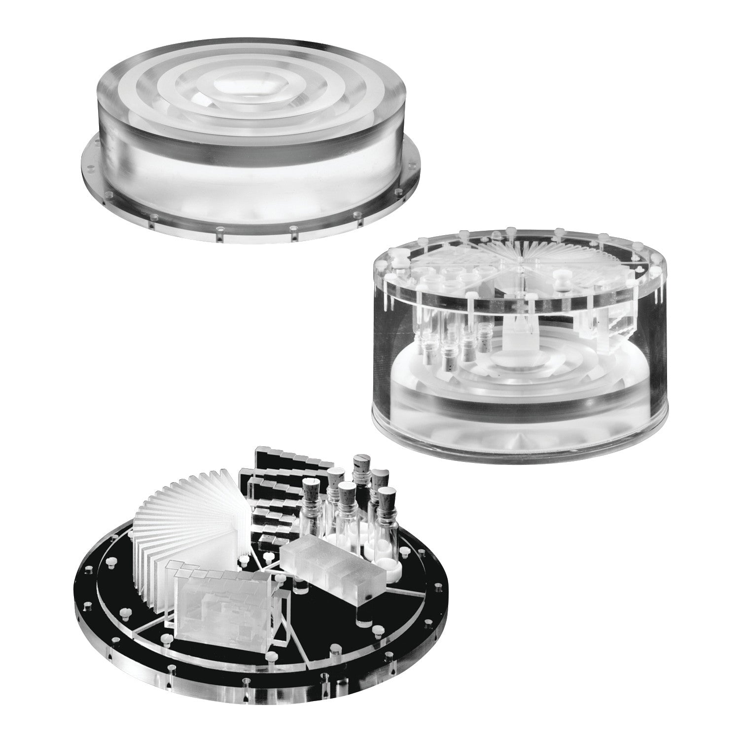 Three parts of the Phantom Bubble Remover Refill Kit are shown, featuring clear and metallic circular components.