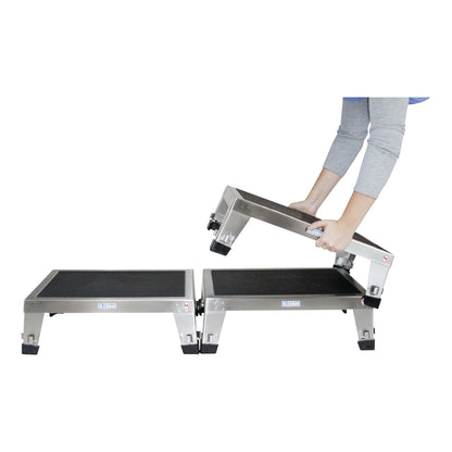 Person stacking a 'Blickman EZ Stacking Stool' on top of two others, showing its modular design.