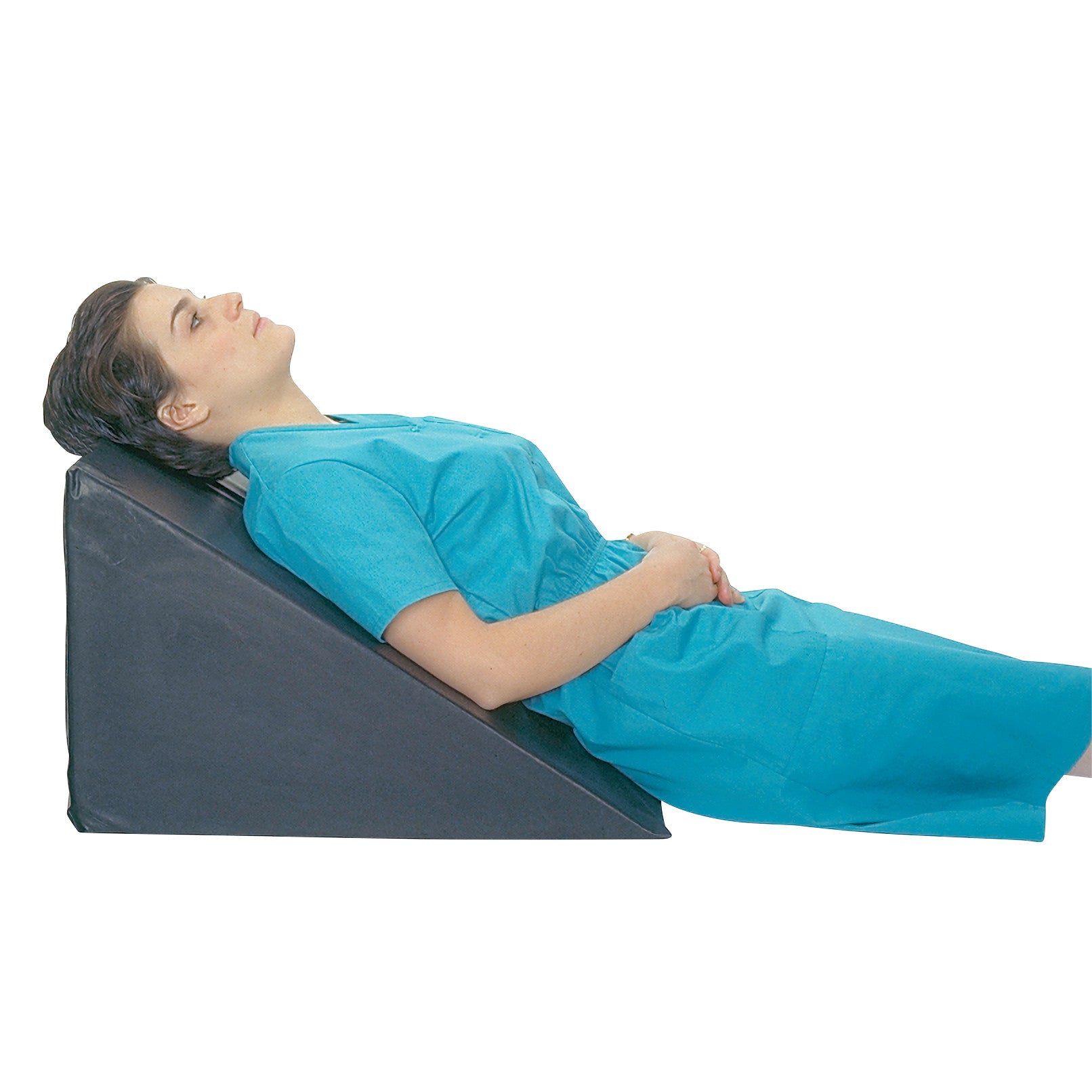 Woman in blue clothing reclines on an AliMed Vinyl-Covered Birthing Wedge, positioned at an angle for support.