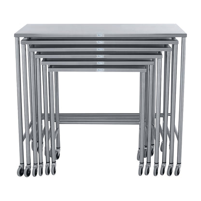 Six Blickman Nested Instrument Tables, in a set, are shown on wheels, stacked to fit within each other.
