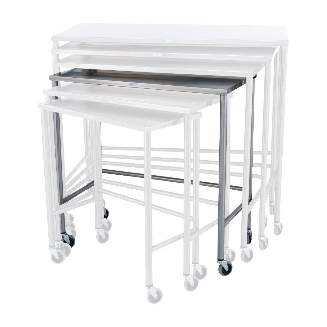 Set of Blickman Nested Instrument Tables, Single Table shown. They are white, rectangular, and have wheels for mobility.