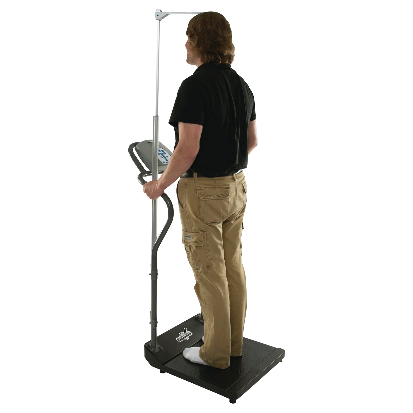 A person stands on a Health o meter Digital Platform Scale with Height Rod, facing forward while holding the height rod handle.