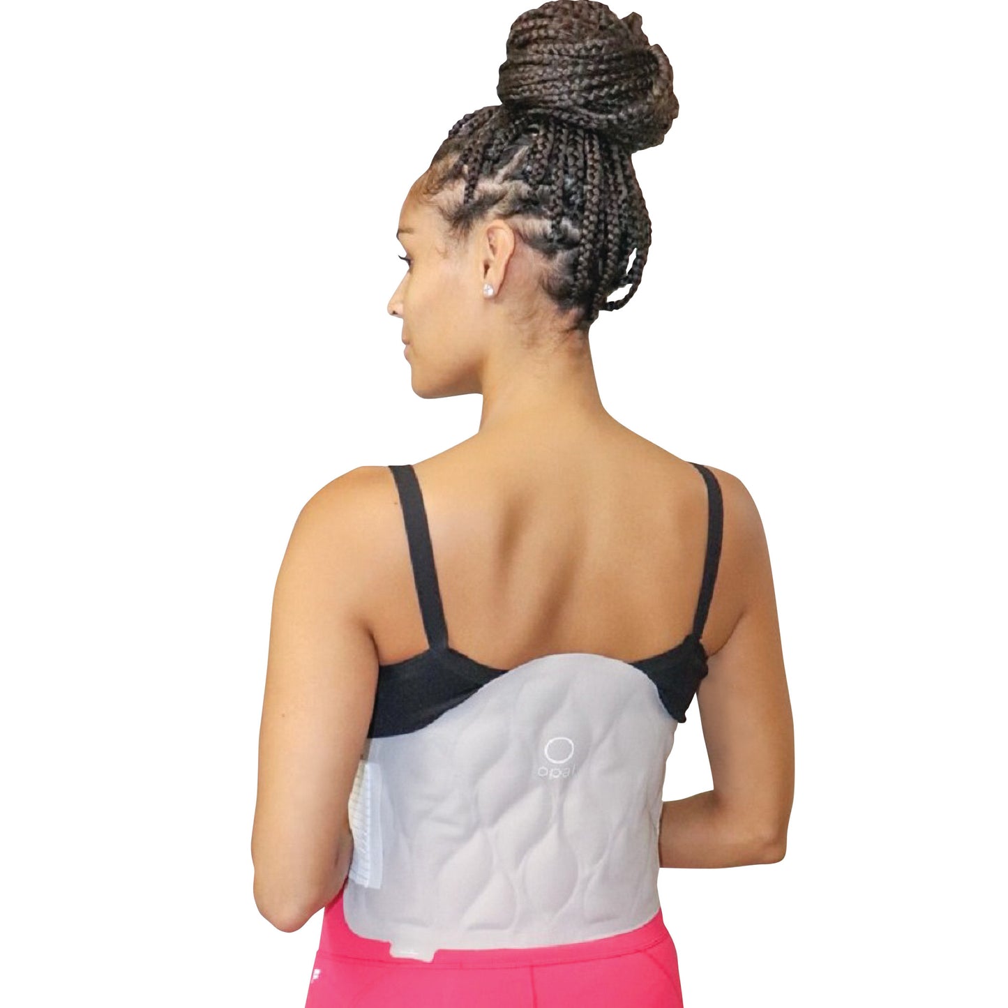 A woman wears the Xena Therapies Opal Cool One, a cooling back wrap. She faces away, showcasing the product's fit and design.