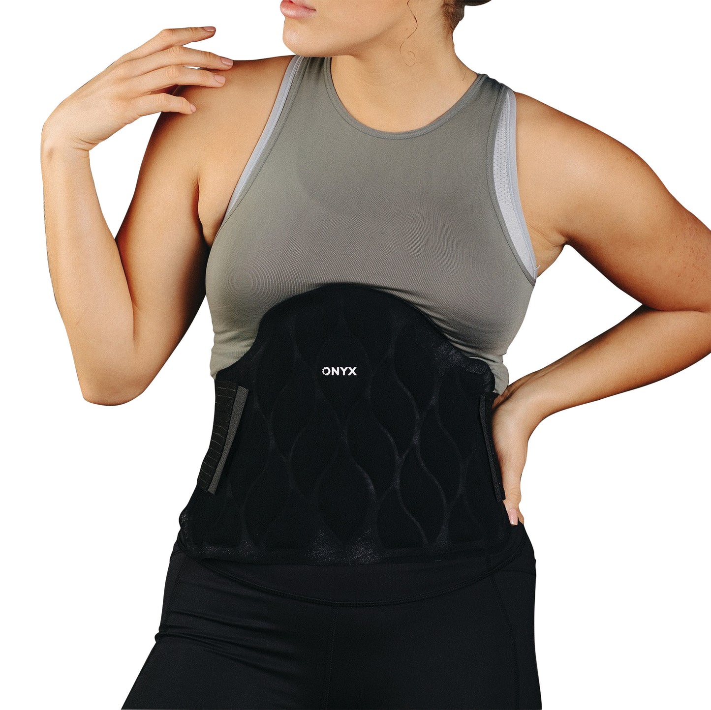 A person wears the Xena Therapies Onyx Cool Back/Hip wrap, a black quilted support belt, over a gray tank top.