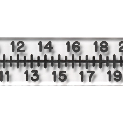 Close-up of a Radiopaque Acrylic Scale, showing numbers 11 to 20 with black markings on a transparent background.