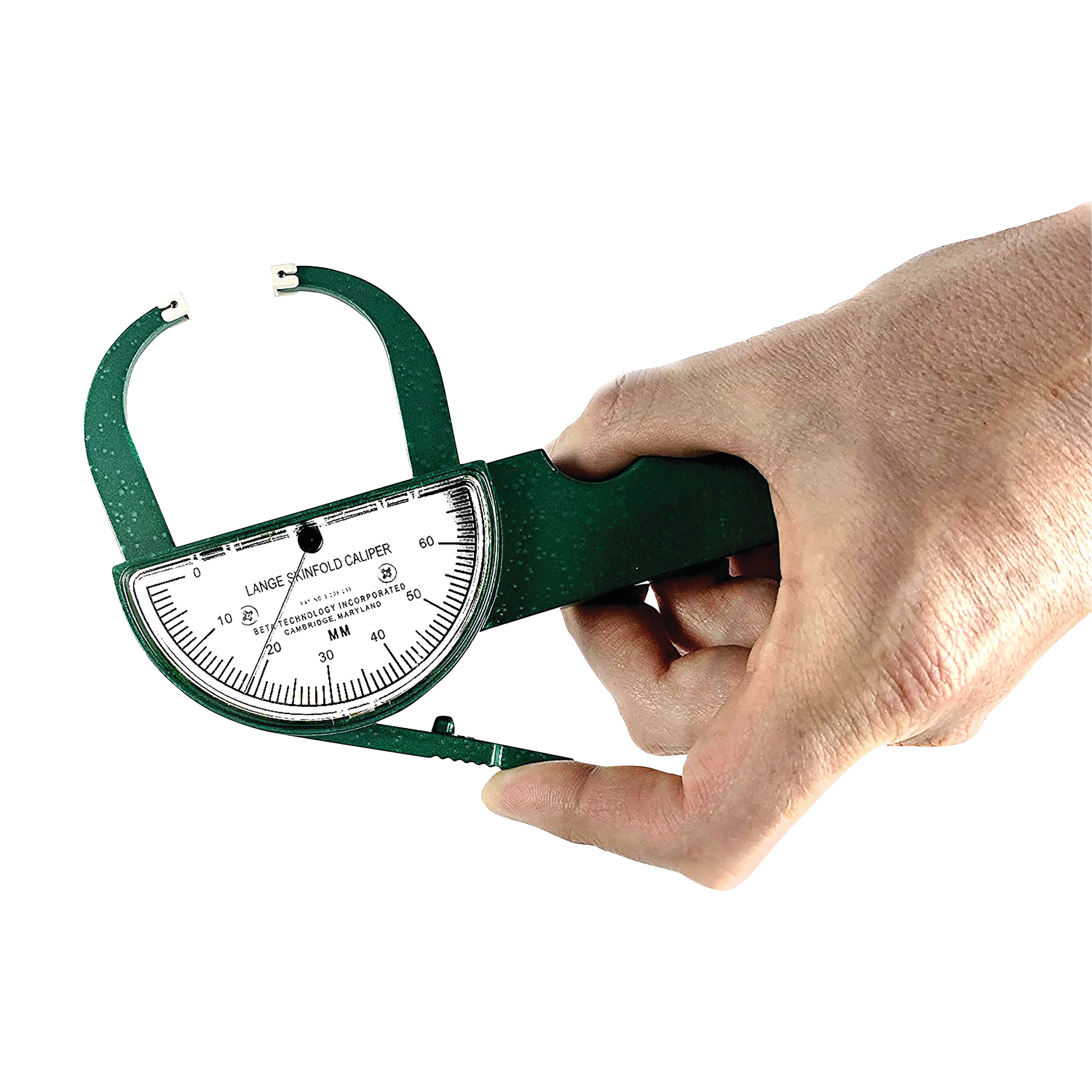 A hand holds a green Lange Skinfold Caliper with a dial displaying measurements in millimeters, used for body fat assessments.