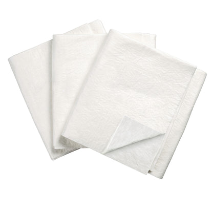 Three folded SpilfyterMED White Absorbent Mats for Emergent Use are displayed, showing a soft, textured surface.