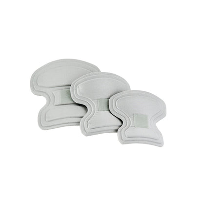Three gray Headmaster Collar pads of varying sizes are displayed, each with a curved design and a central strap.