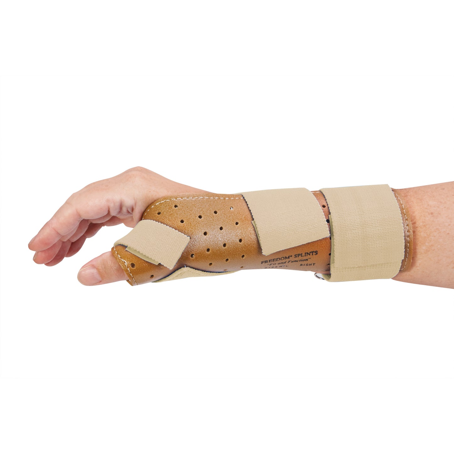 A hand wearing an AliMed FREEDOM Thumb Spica with a perforated tan brace and blue straps for thumb and wrist support.