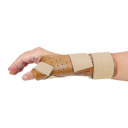 A hand wearing the AliMed FREEDOM Thumb Spica, a brown brace with blue straps, designed to support the thumb and wrist.