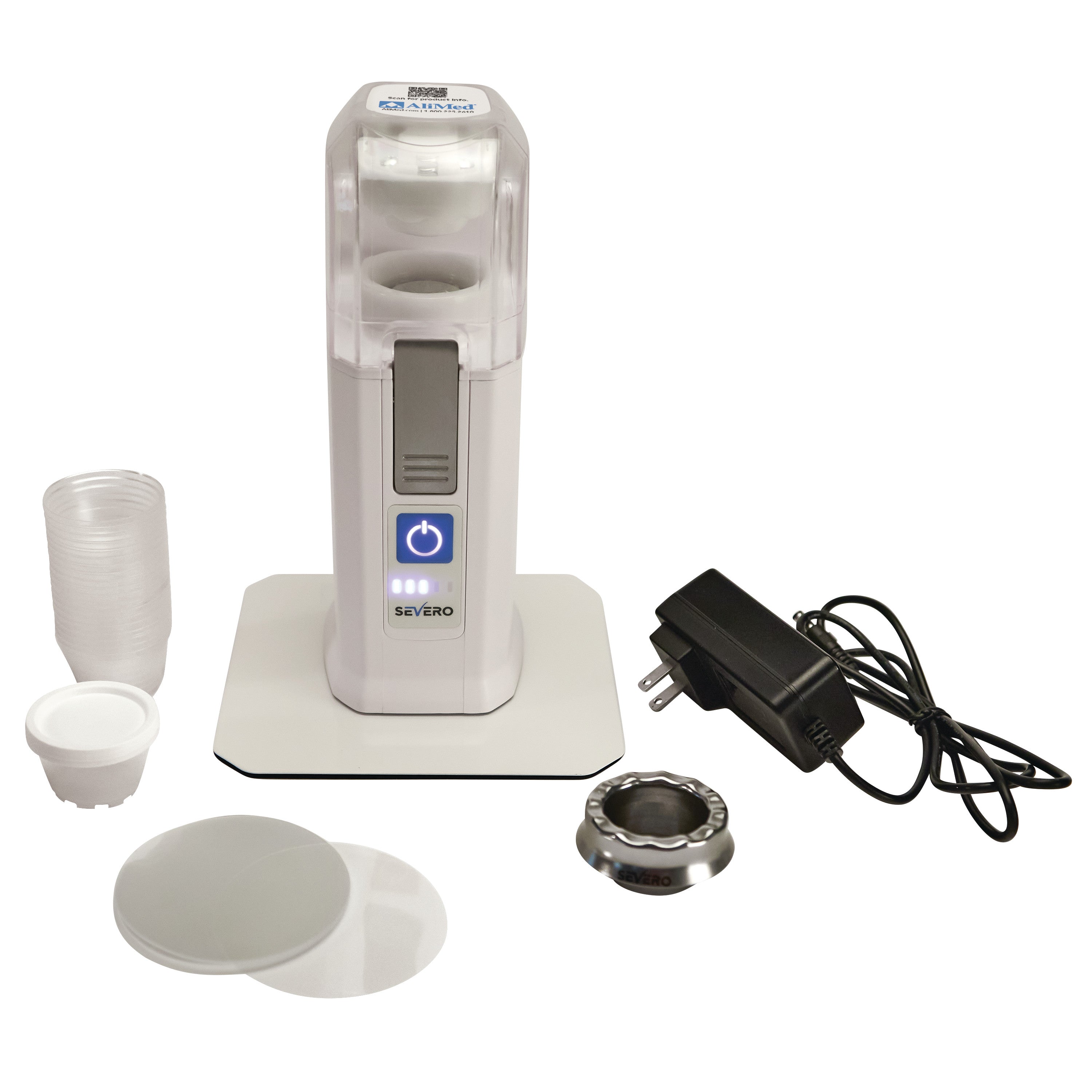 A Severo Electric Pill Grinder with a charger, cups, and accessories on a white surface.