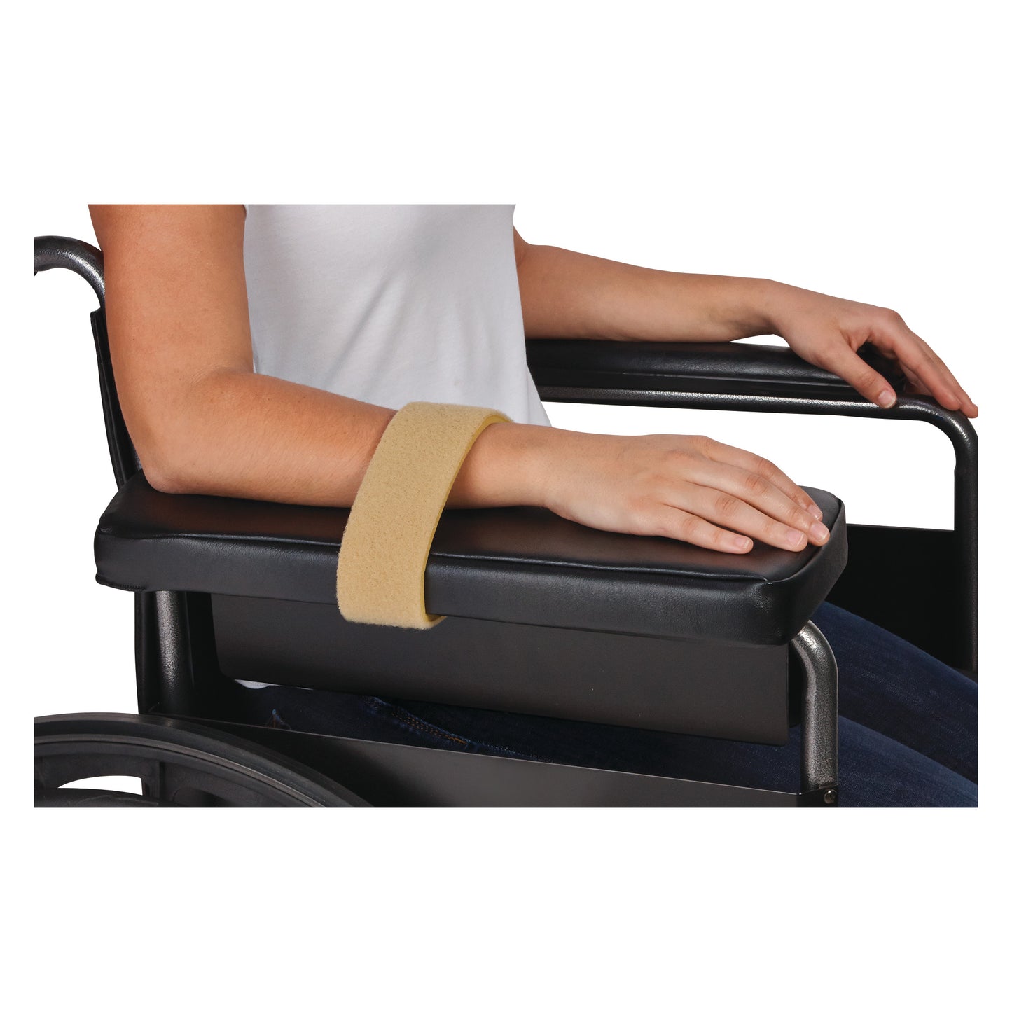 A person rests their arm on a wheelchair armrest, secured with an AliMed Super Beta Pile II Loop in beige for support.