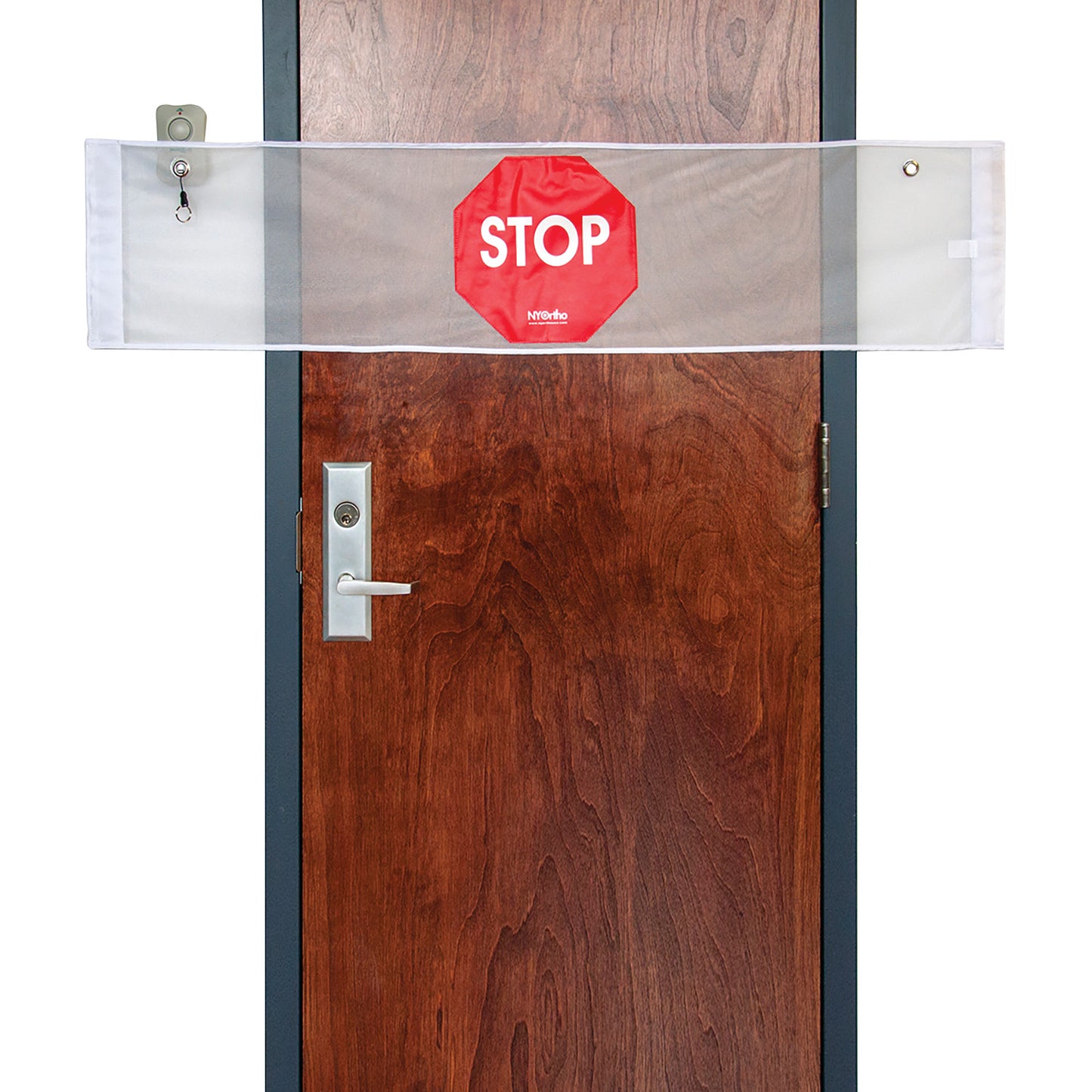 The NYOrtho Door Guard Stop Sign with Alarm is attached to a wooden door, featuring a clear strip with a red stop sign image.