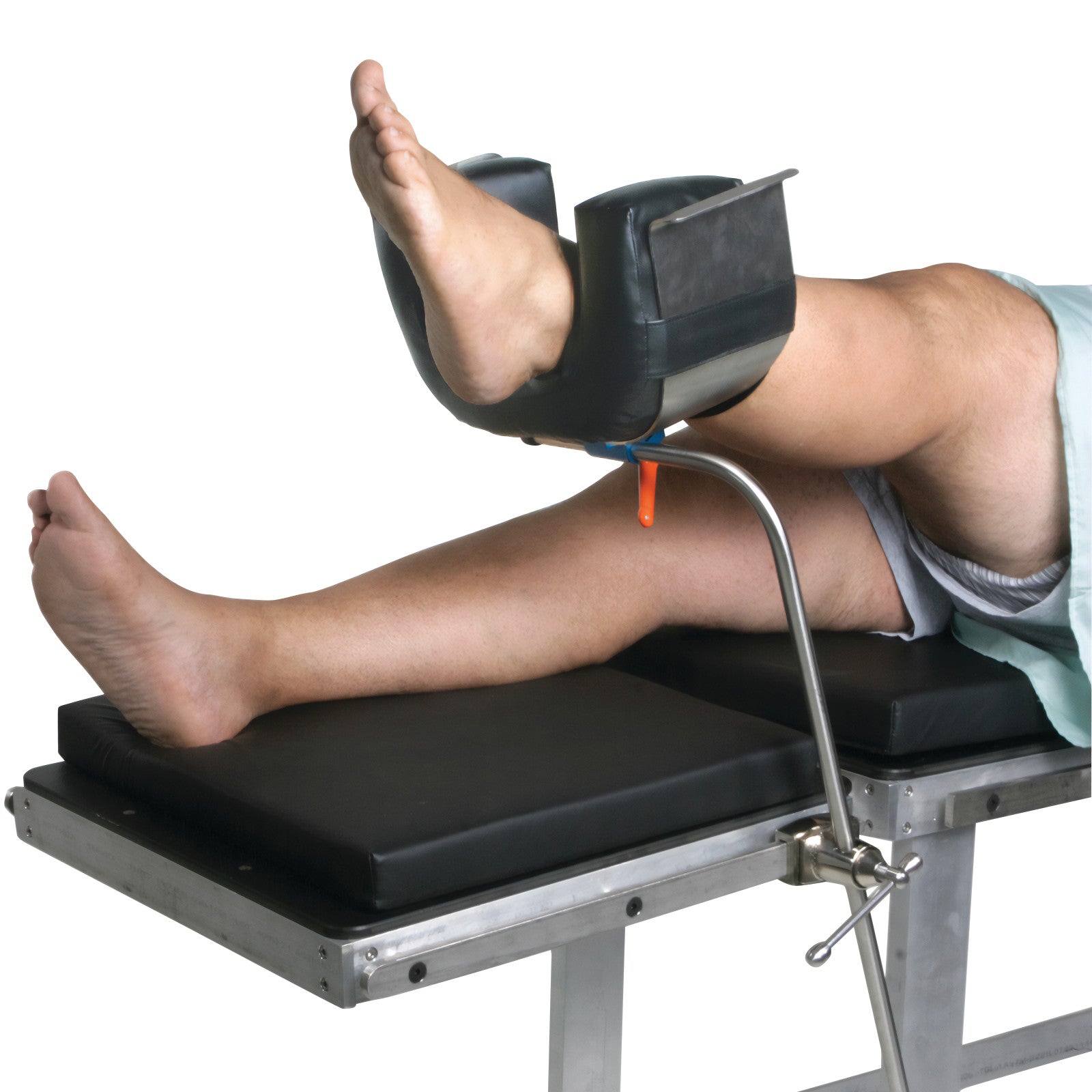 A leg is positioned using the AliMed Bariatric Universal Positioner, showing a supported bent leg on a medical table.