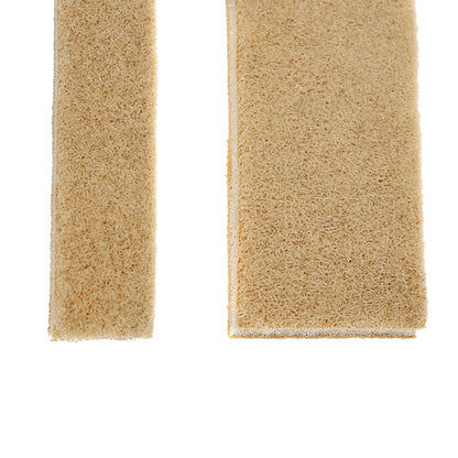 Close-up of two beige strips of AliMed Super Beta Pile II Loop, showing their textured surfaces on a white background.
