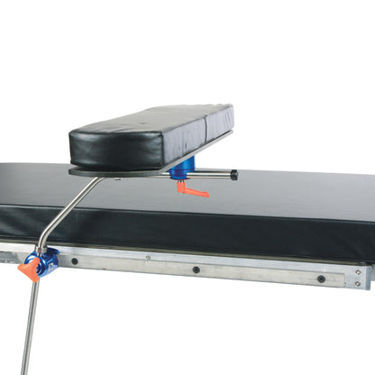 An AliMed Versa-Board, a black cushioned support board with adjustable metal clamps and an orange handle.