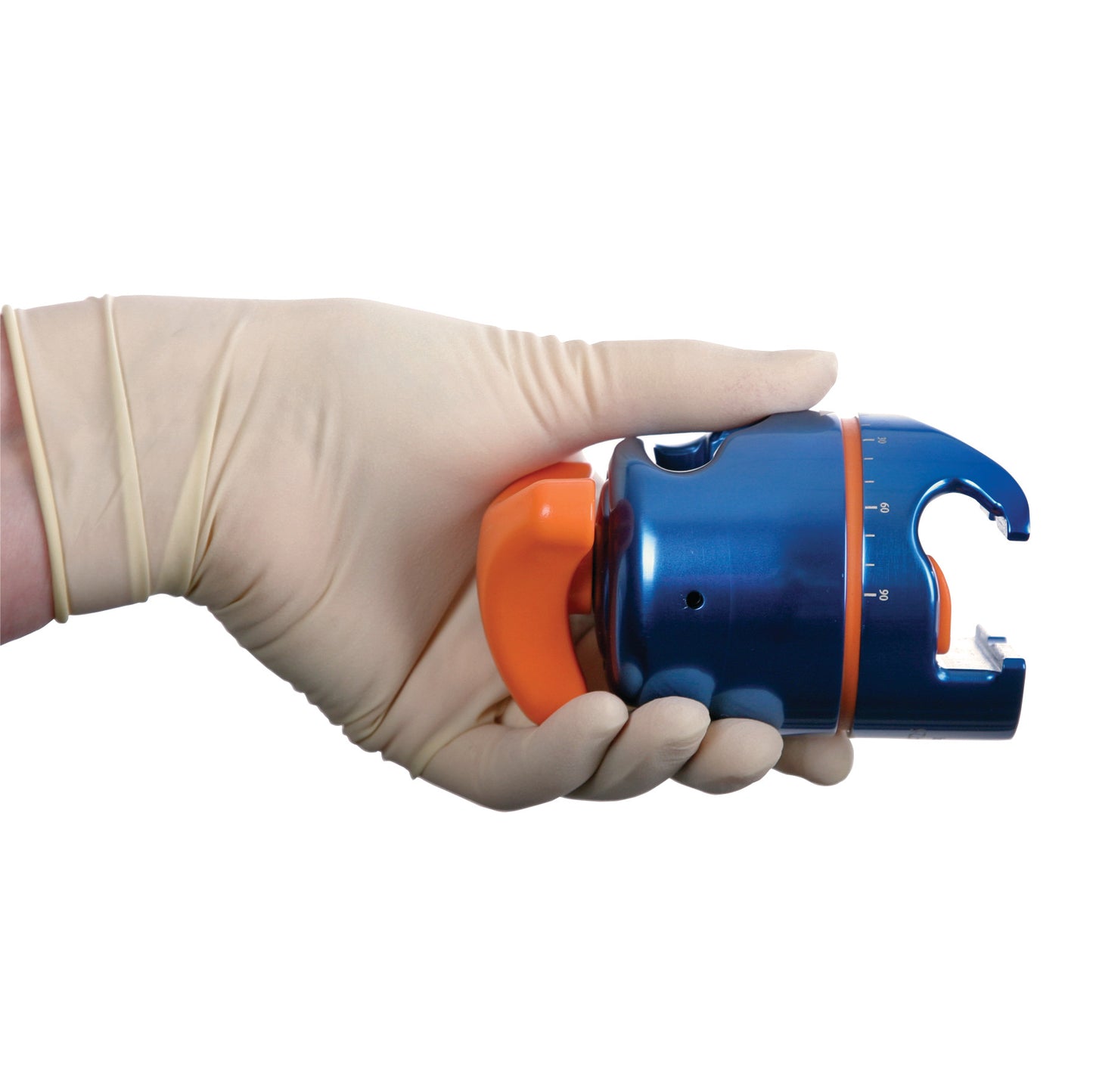 A gloved hand holding an AliMed FREEDOM Clark Socket Table Clamp, featuring a blue and orange design with measurement markings.