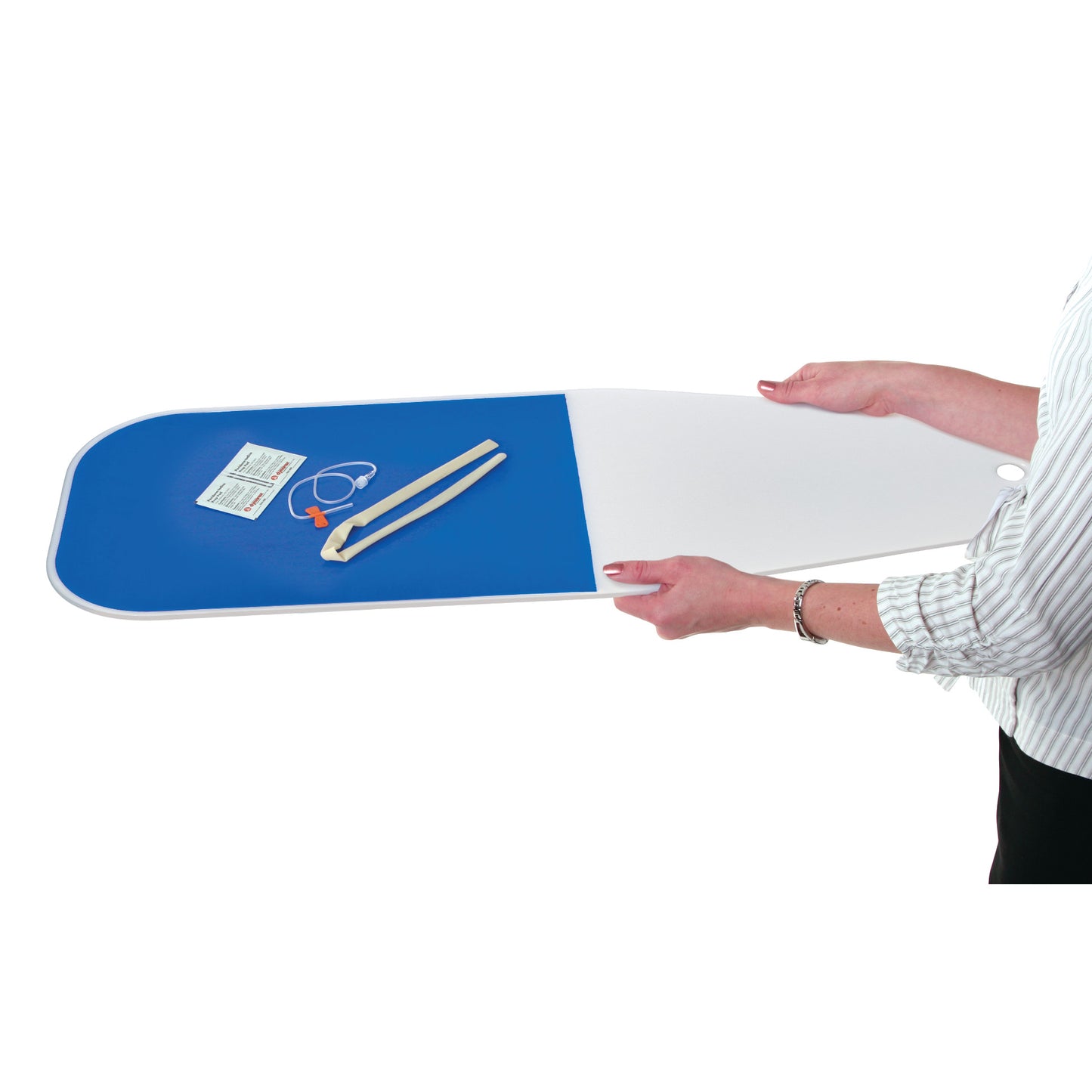 Person holding an AliMed Wide Universal Armboard with a blue surface, featuring a medical pamphlet, a strap, and tubing.
