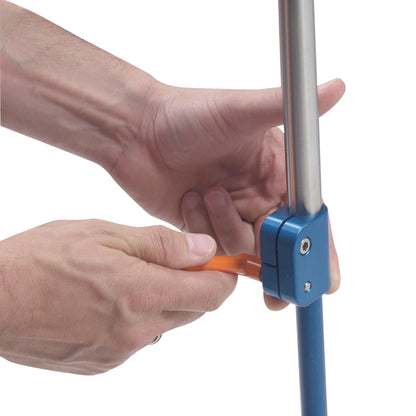 Hands adjust an Attachable Hand Table Leg, featuring a blue joint and metal rod, using an orange lever.