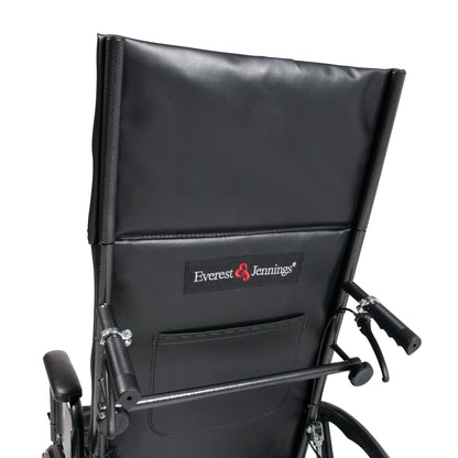 The back of an Everest & Jennings Advantage Recliner Wheelchair. It features a black seat with handles and logo.