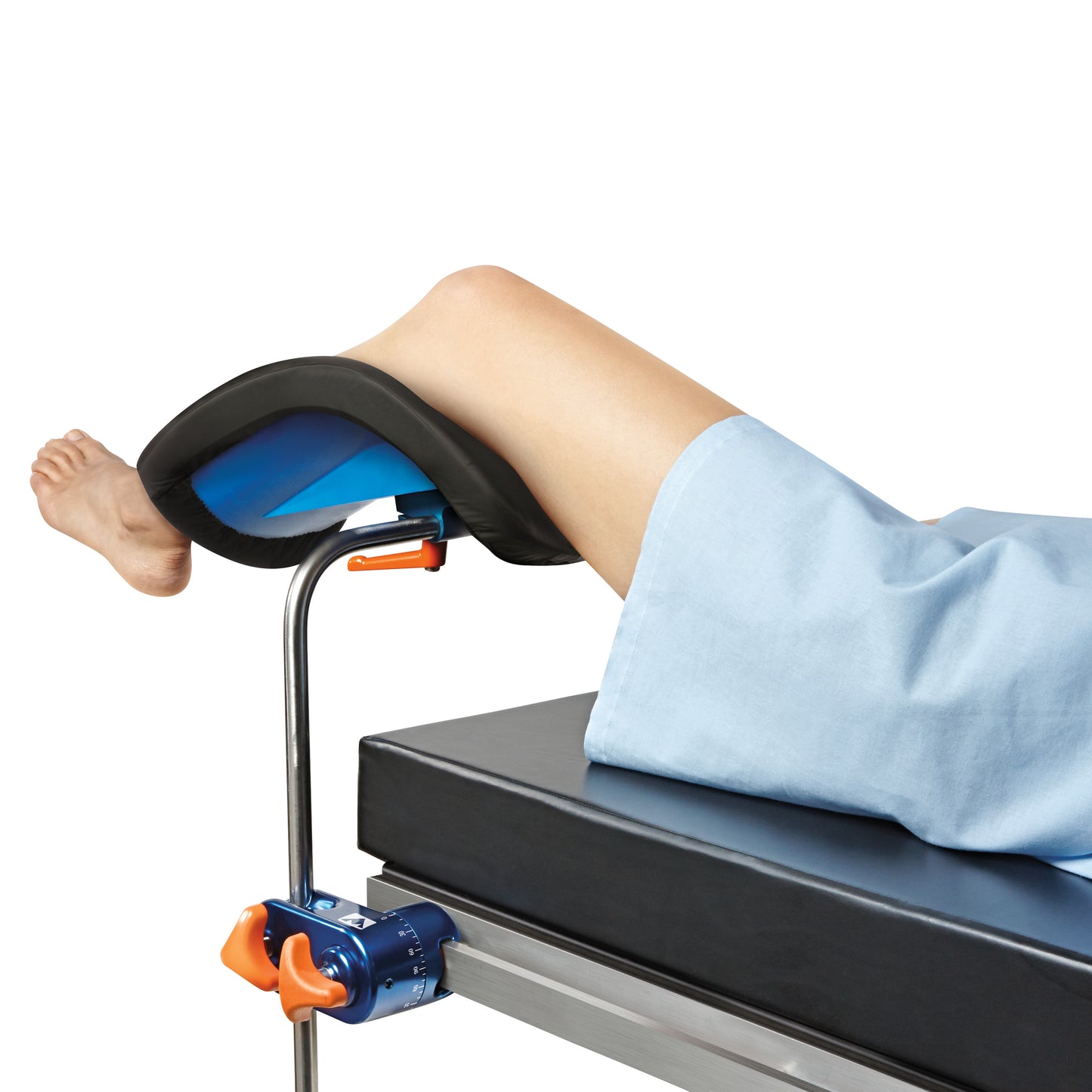 A person's leg is placed in an AliMed FREEDOM 360 Socket, secured on an adjustable medical table with blue and orange knobs.