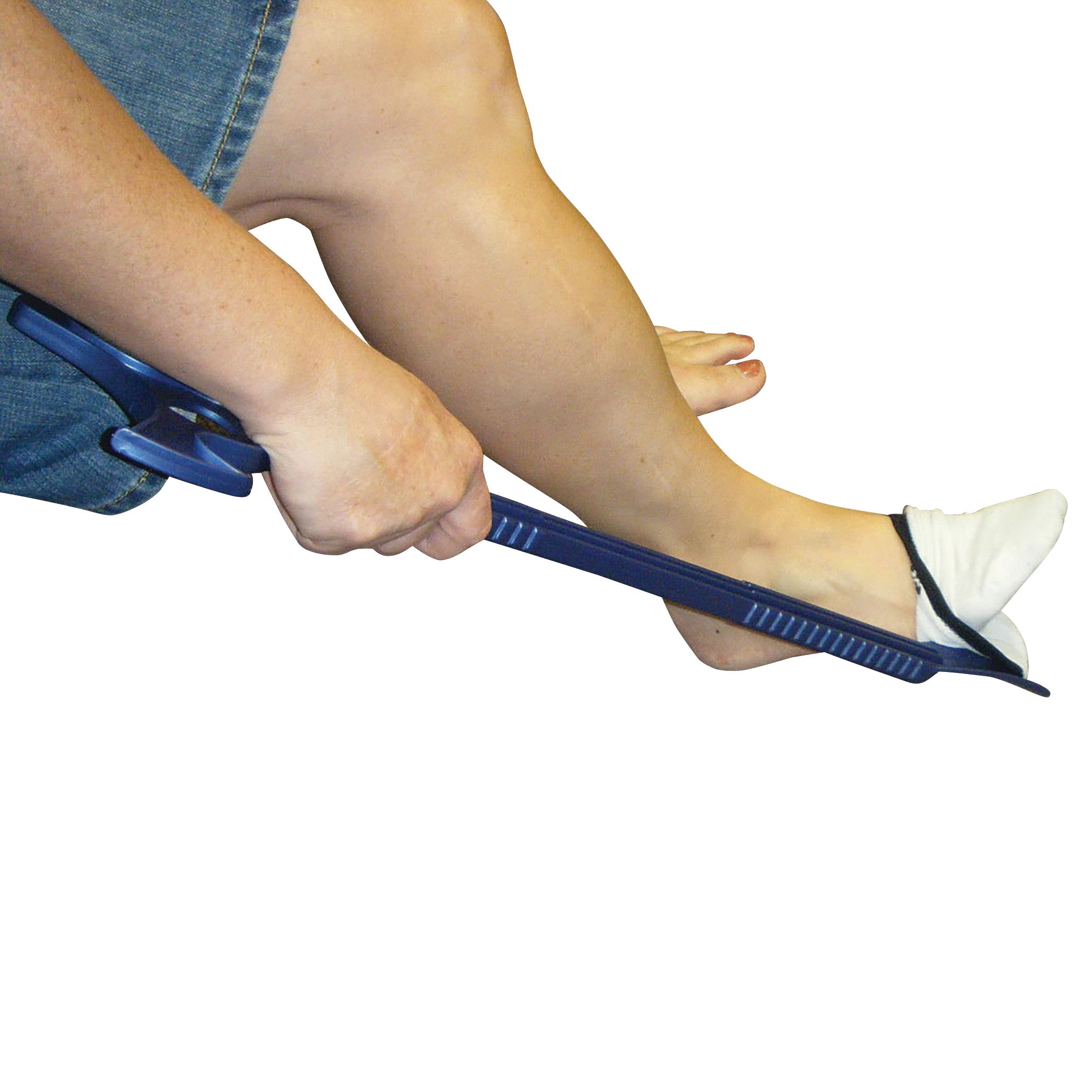 A person uses the Combination Dressing Stick to remove a sock, demonstrating its function and design.
