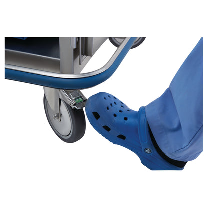 A foot in blue footwear operates a Blickman Mini Case Cart wheel lock mechanism with a "STEER" label on the caster.
