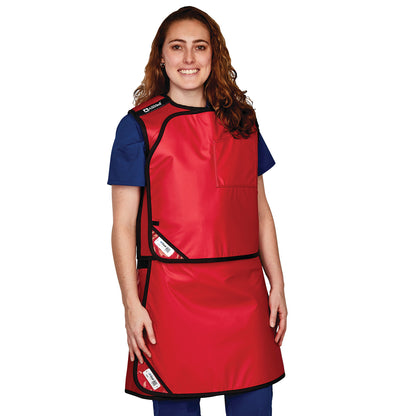 A woman wears the AliMed Grab n Go Vest and Kilt Set, Female, in bright red with black trim, over blue scrubs.