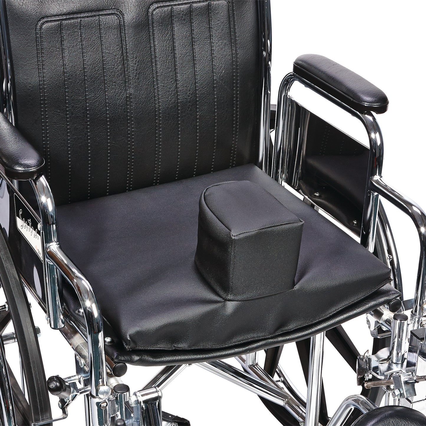 A black wheelchair with an AliMed Solid Seat Insert with Pommel placed on the seat for added support and positioning.