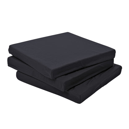 A stack of three AliMed Foam Economy Wheelchair Cushions with black covers, designed for comfort and support on wheelchairs.