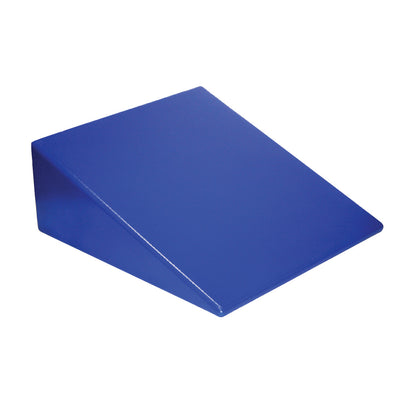 A blue Skillbuilders Positioning Wedge with a flat top and sloped side used for therapeutic support or exercise.